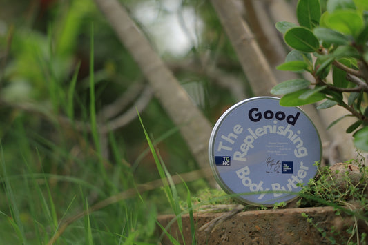 A round tin of good replenishing body butter.